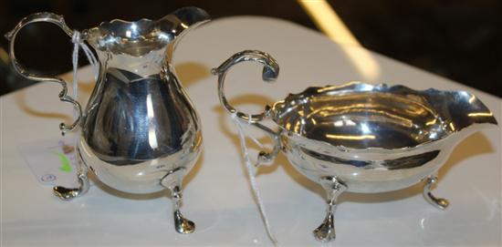 George II silver sauce boat, 1759 & a similar cream jug